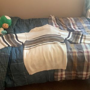 The brand name is edge it is a large sweater